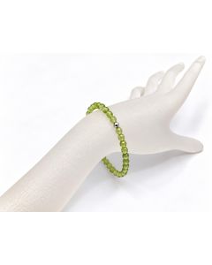 Bracelet, olivine-peridote (faceted) and real silver sphere, 4 mm spheres; 1 piece