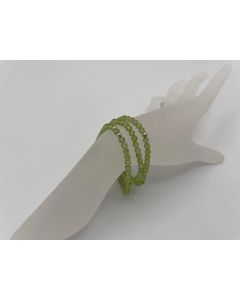 Bracelet, olivine-peridote (faceted) and real silver sphere, 4 mm spheres, 1 piece
