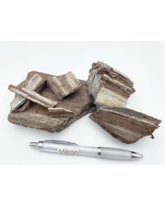 Fossilized petrified wood, with quartz xls; Schwenkau, Saxony, Germany; 1 kg