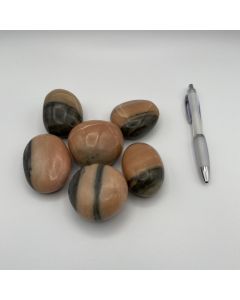 Calcite hand charm; orange, polished, Madagascar; 1 kg