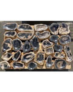 Fossilized petrified wood; shell, partially polished, "dark", Sumatra, Indonesia; 1 pallet with 72 kg